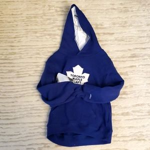 Blue coloured Toronto Maple Leafs hoodie/sweatshirt.